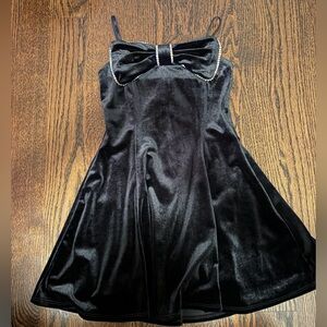 Love, Nickie Lew black velvet party dress with rhinestone bow, size 7
